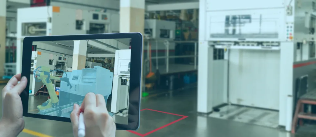 A user in a facility is using Augmented Reality and Digital Twin technology. He is holding a tablet in front of an equipment.