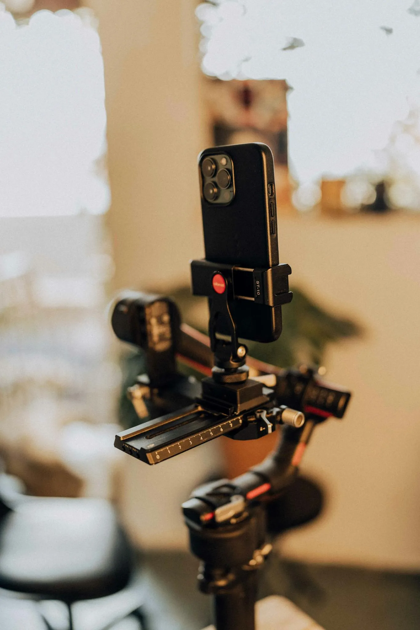Close-up of a professional smartphone rig mounted on a tripod, perfect for videography.